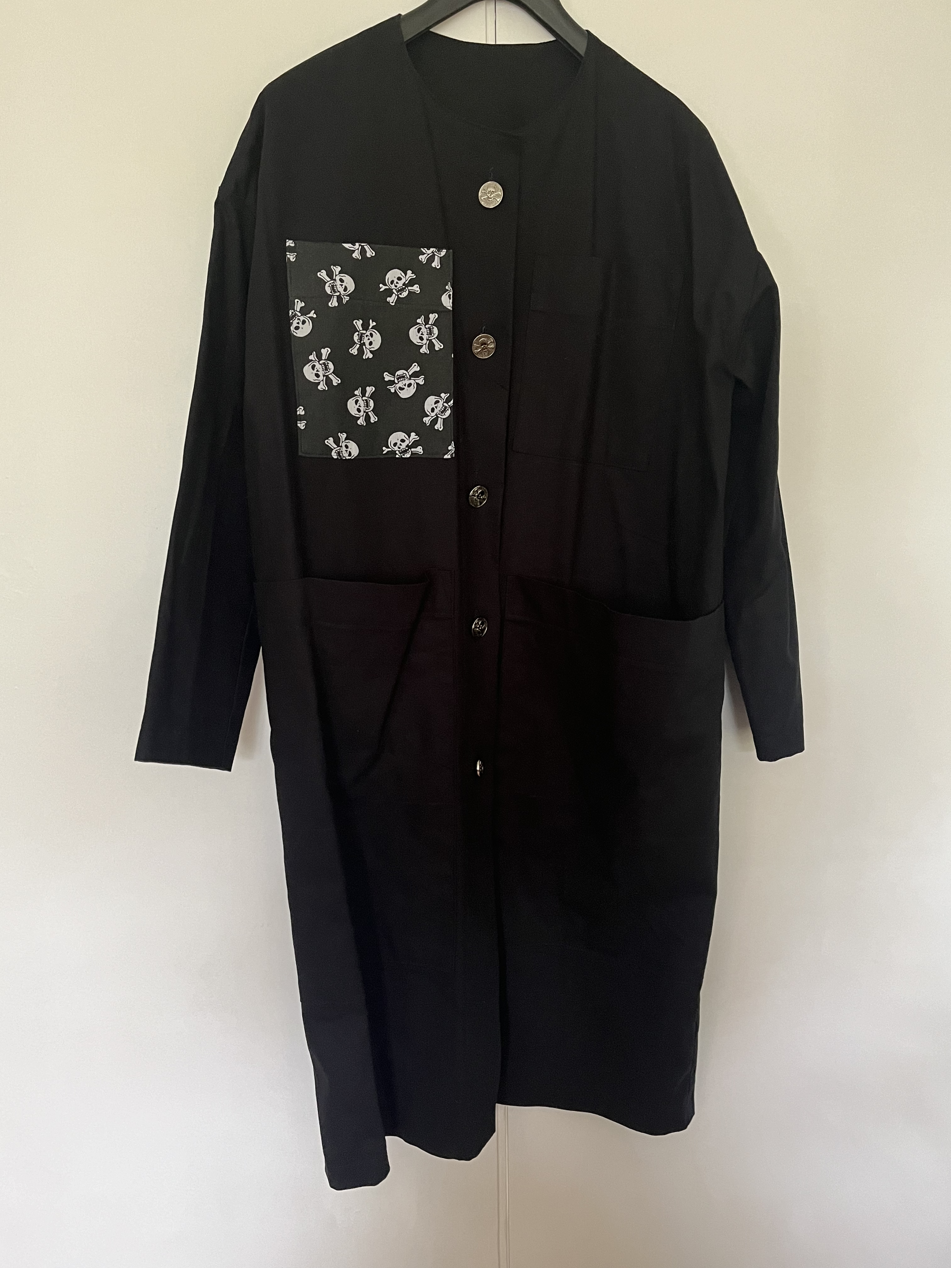 Black contrast lab coat with skull patch
